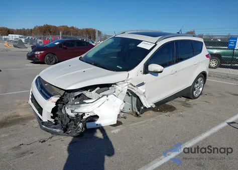 2016 Ford Escape Titanium z USA, uszkodzony, nr VIN 1FMCU0J97GUA74304